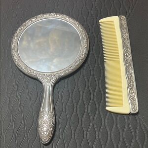 Elegant Silver Hand Mirror and Comb Set